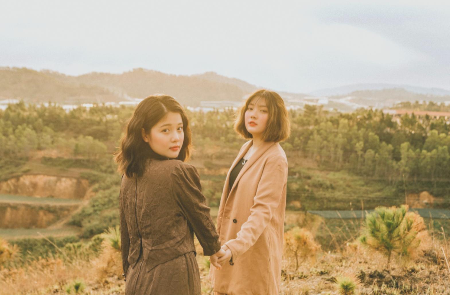 Student practicing creative hair styling techniques during workshop session